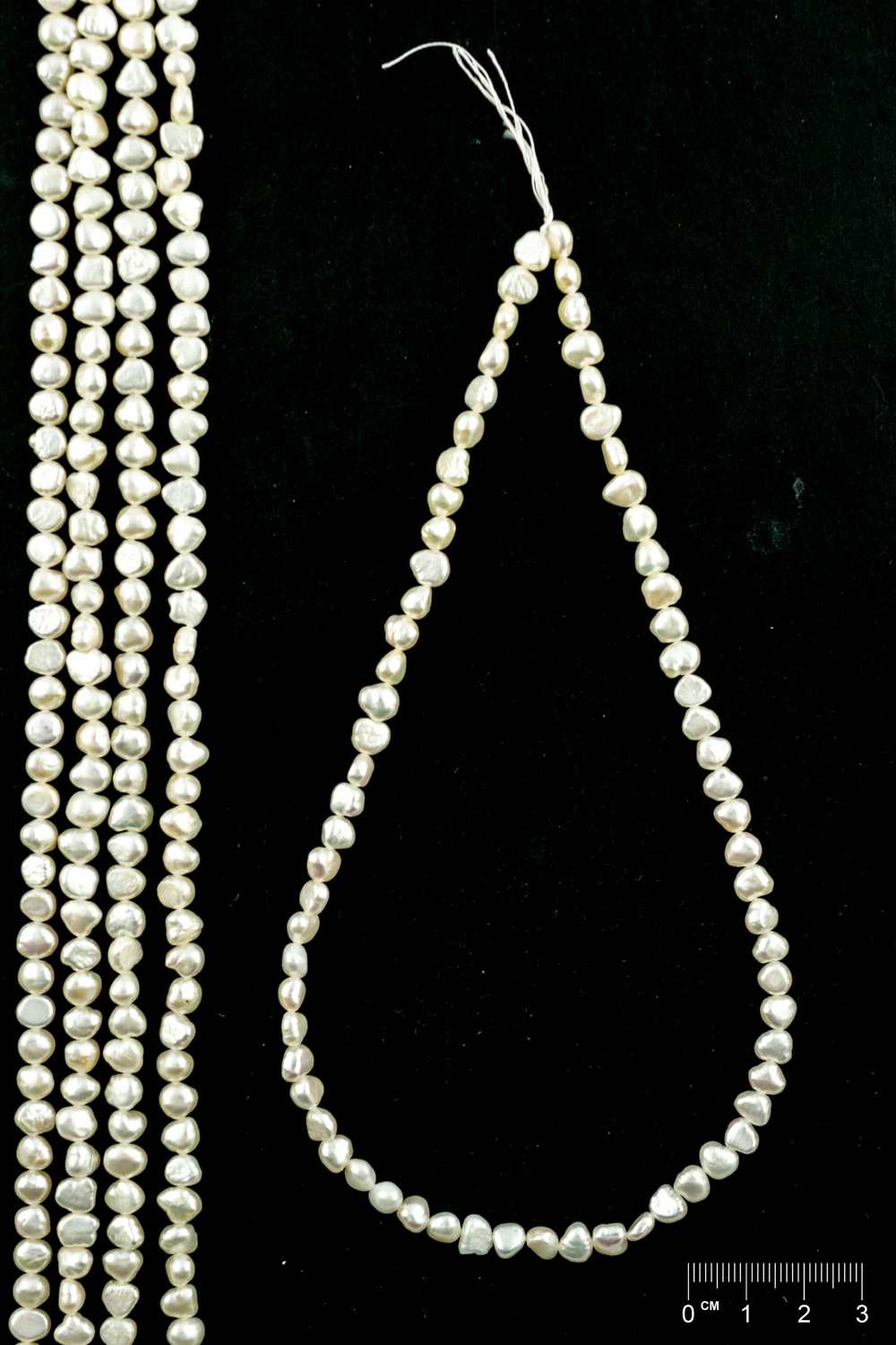 Rang Perles de culture d'eau douce baroque blanches